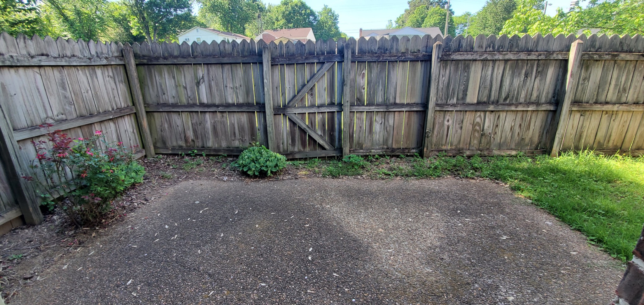 716 Kent Road Nashville, TN 37214 - Photo 7 of 15 a view of a backyard with a wooden fence