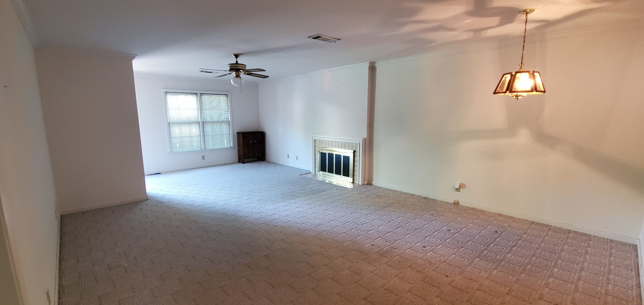 716 Kent Road Nashville, TN 37214 - Photo 8 of 15 an empty room with windows and fan