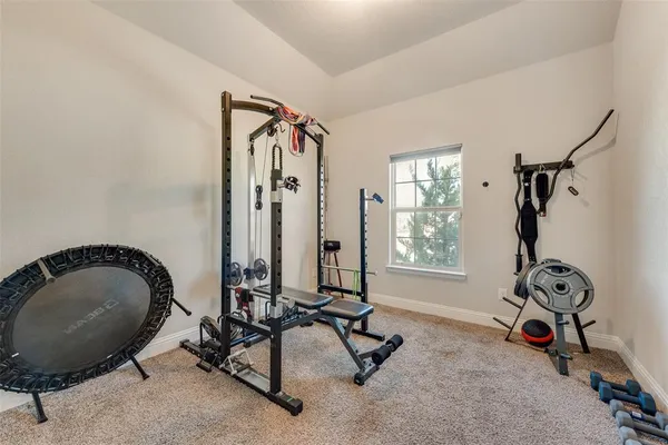 a view of a room with gym equipment
