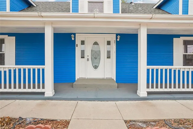 a view of a door and a window