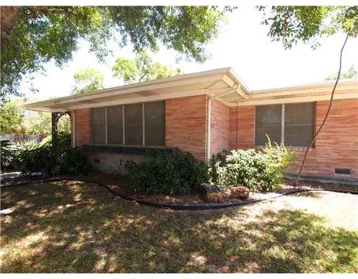 a front view of a house having yard