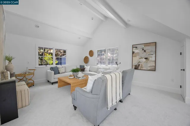 a living room with furniture and window