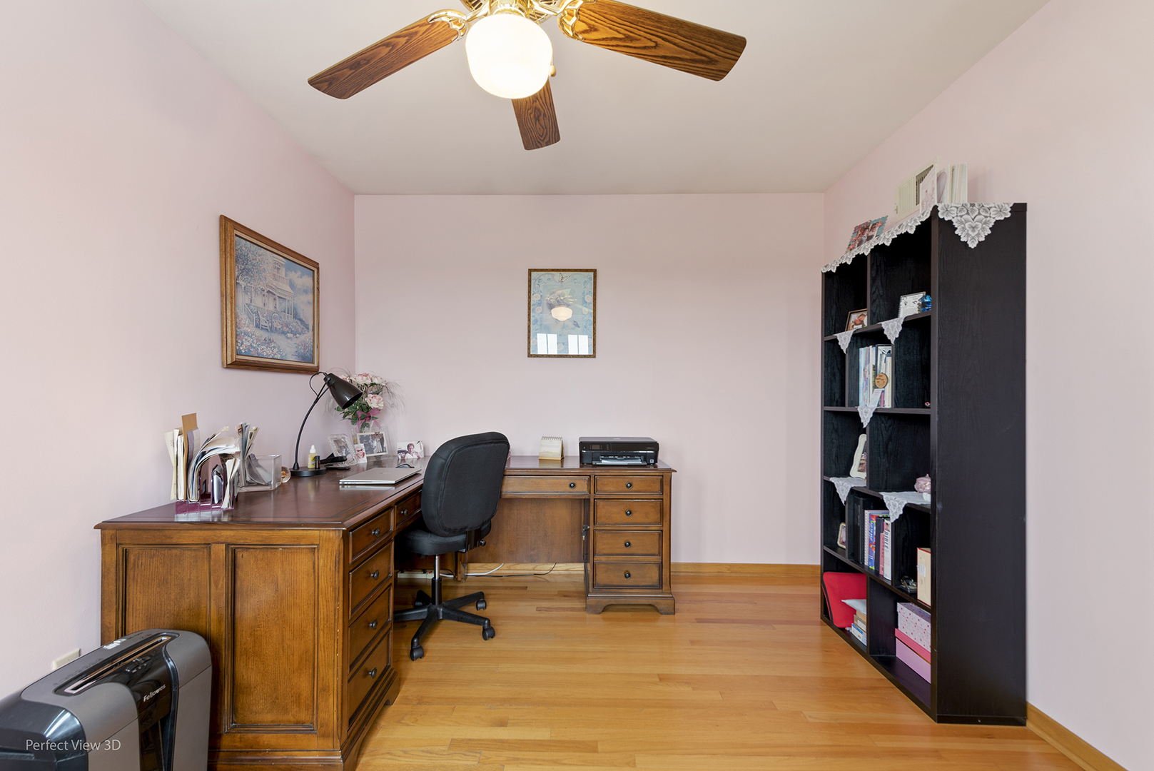 13836 West Joliet Road Manhattan, IL 60442 - Photo 22 of 25 a view of a workspace with furniture and a ceiling fan