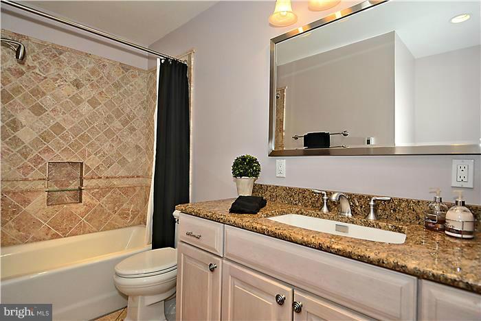 1945 Foxhall Road McLean, VA 22101 - Photo 17 of 30 Hall Bath with gorgeous ceramic and granite