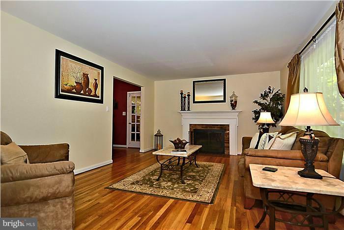 1945 Foxhall Road McLean, VA 22101 - Photo 4 of 30 Elegant Living Room has picture window & fireplace
