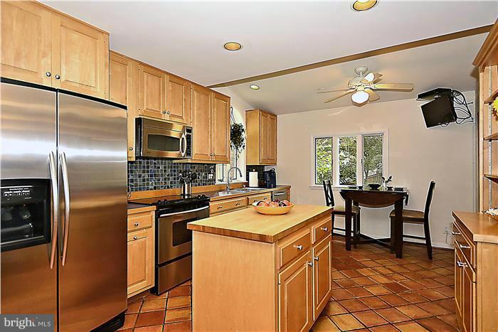 1945 Foxhall Road McLean, VA 22101 - Photo 7 of 30 42" maple cabinets. SS appliances, ceramic - wow!