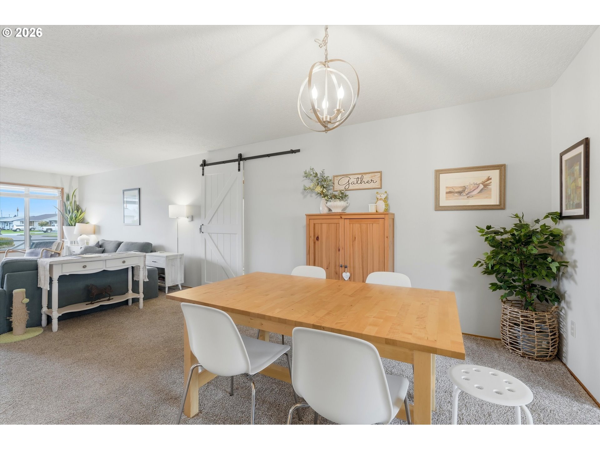 1841 Umpqua Road Woodburn, OR 97071 - Photo 13 of 41 a view of a dining room with furniture and wooden floor