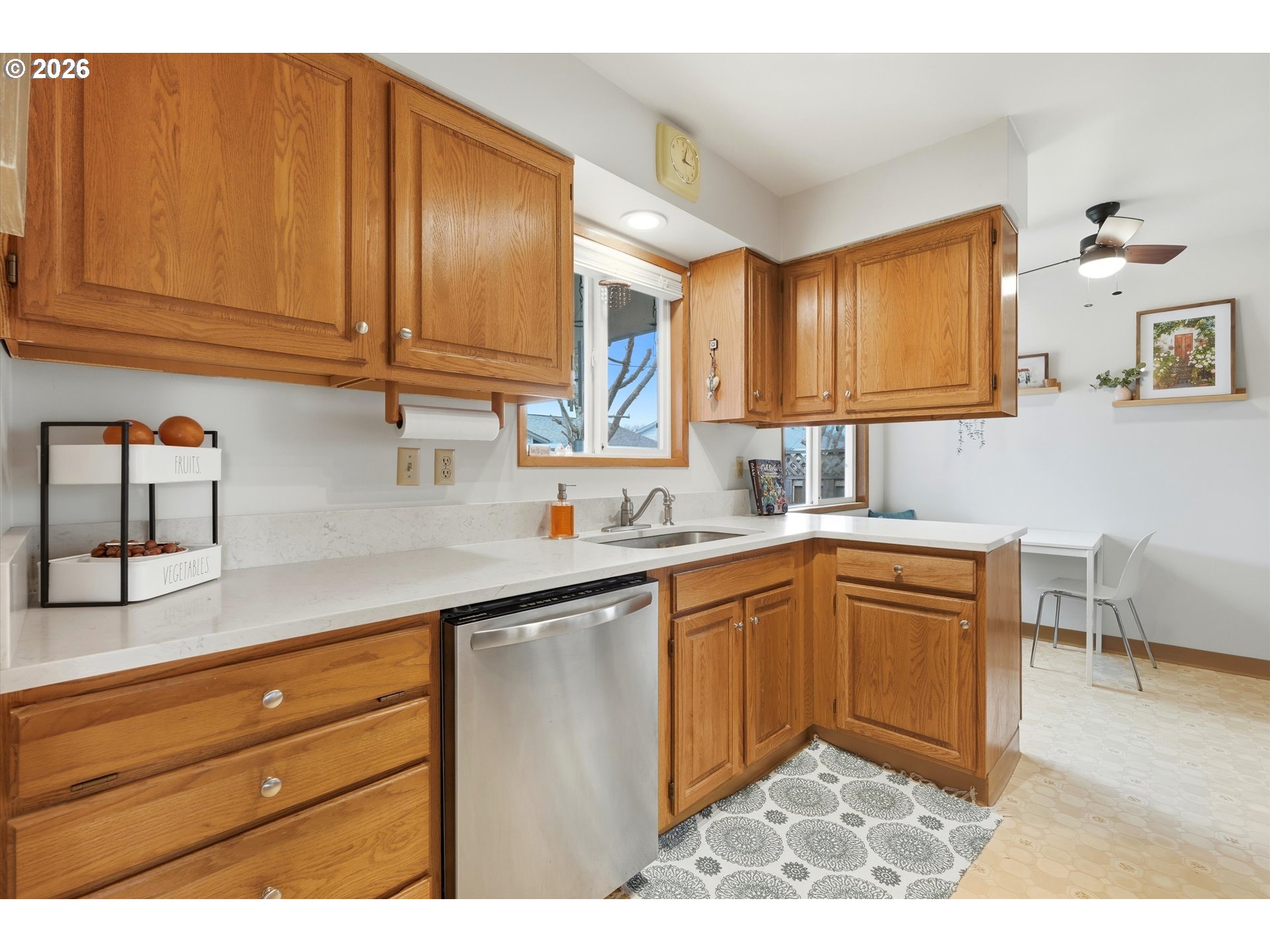1841 Umpqua Road Woodburn, OR 97071 - Photo 14 of 41 a kitchen with stainless steel appliances granite countertop a sink dishwasher stove and cabinets