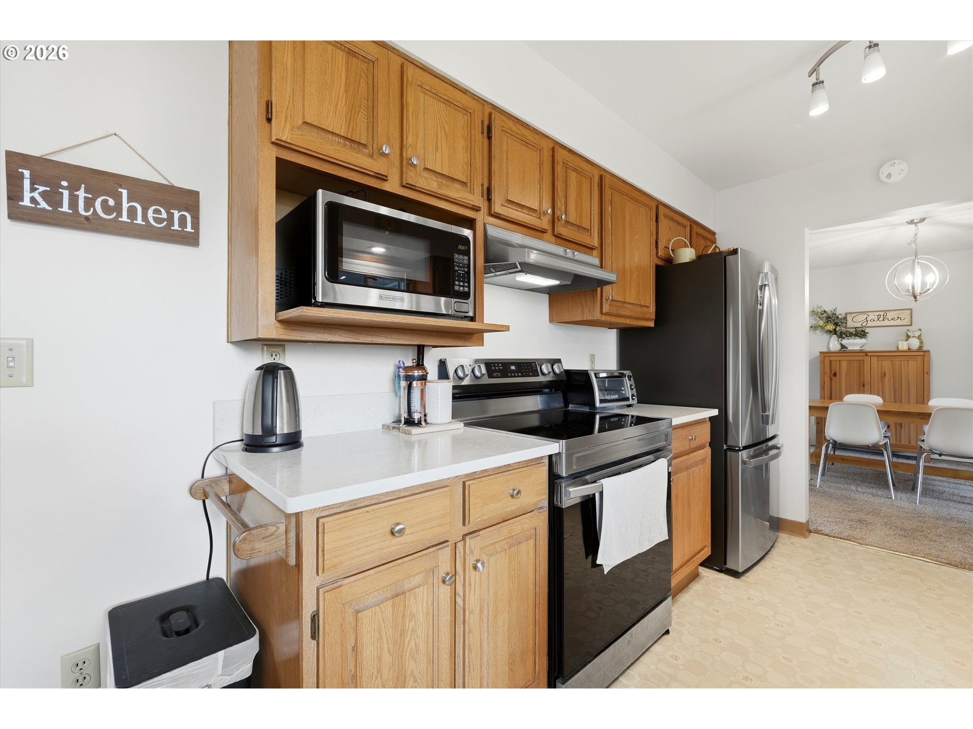 1841 Umpqua Road Woodburn, OR 97071 - Photo 16 of 41 a kitchen with stainless steel appliances granite countertop a sink and a stove