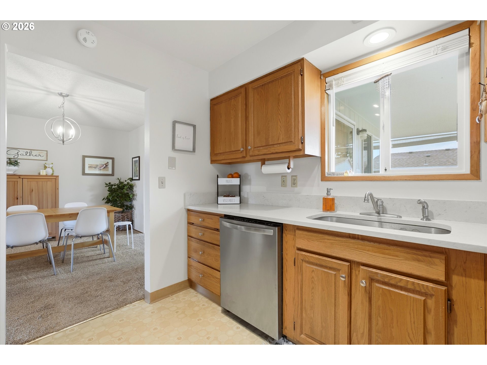 1841 Umpqua Road Woodburn, OR 97071 - Photo 17 of 41 a kitchen with a sink cabinets and wooden floor