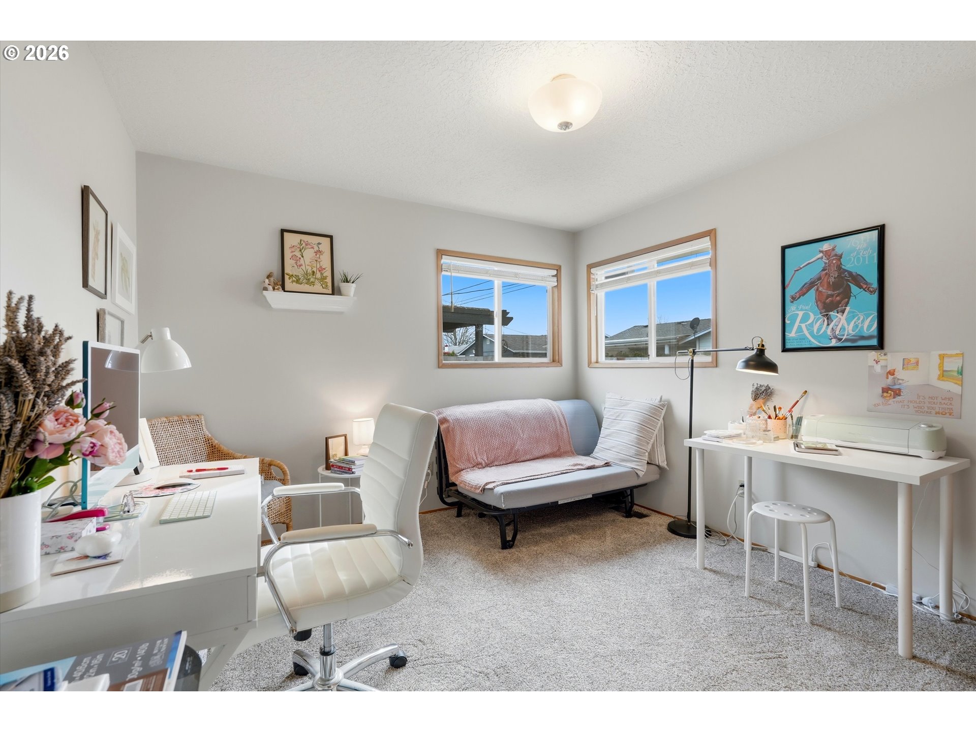 1841 Umpqua Road Woodburn, OR 97071 - Photo 27 of 41 a living room with furniture and a flat screen tv