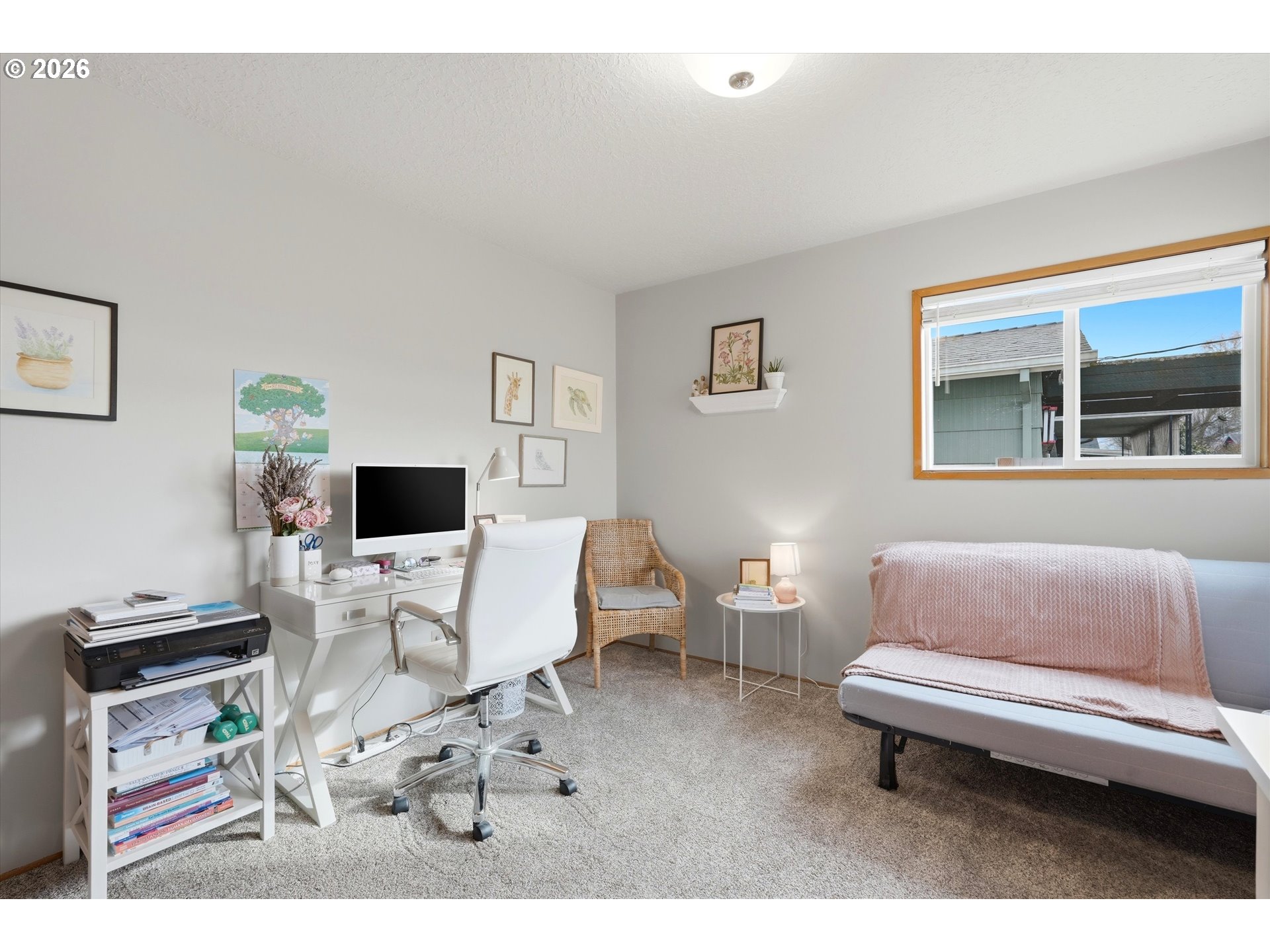 1841 Umpqua Road Woodburn, OR 97071 - Photo 28 of 41 a living room with furniture and a flat screen tv