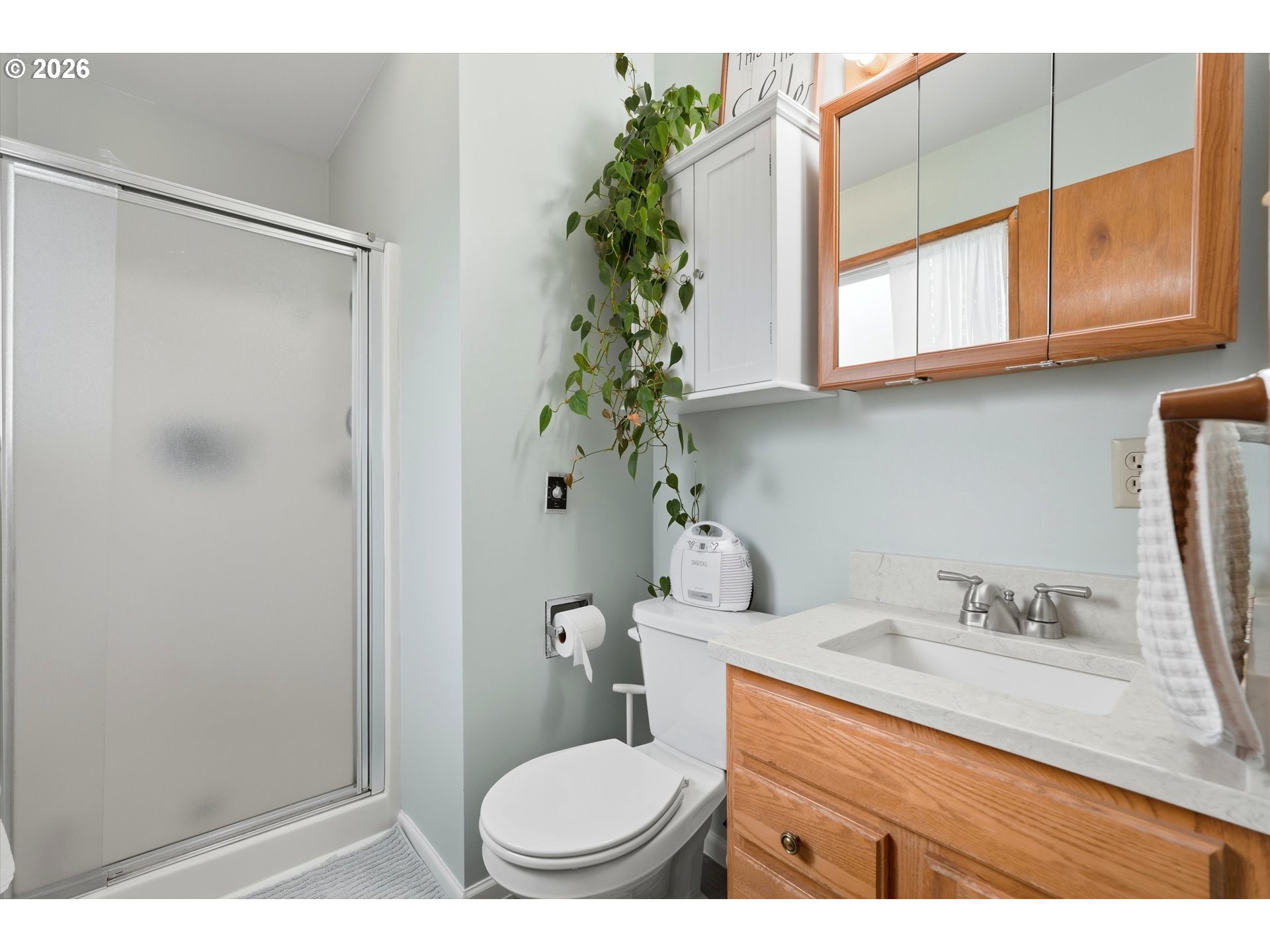 1841 Umpqua Road Woodburn, OR 97071 - Photo 37 of 41 a bathroom with a sink toilet and shower