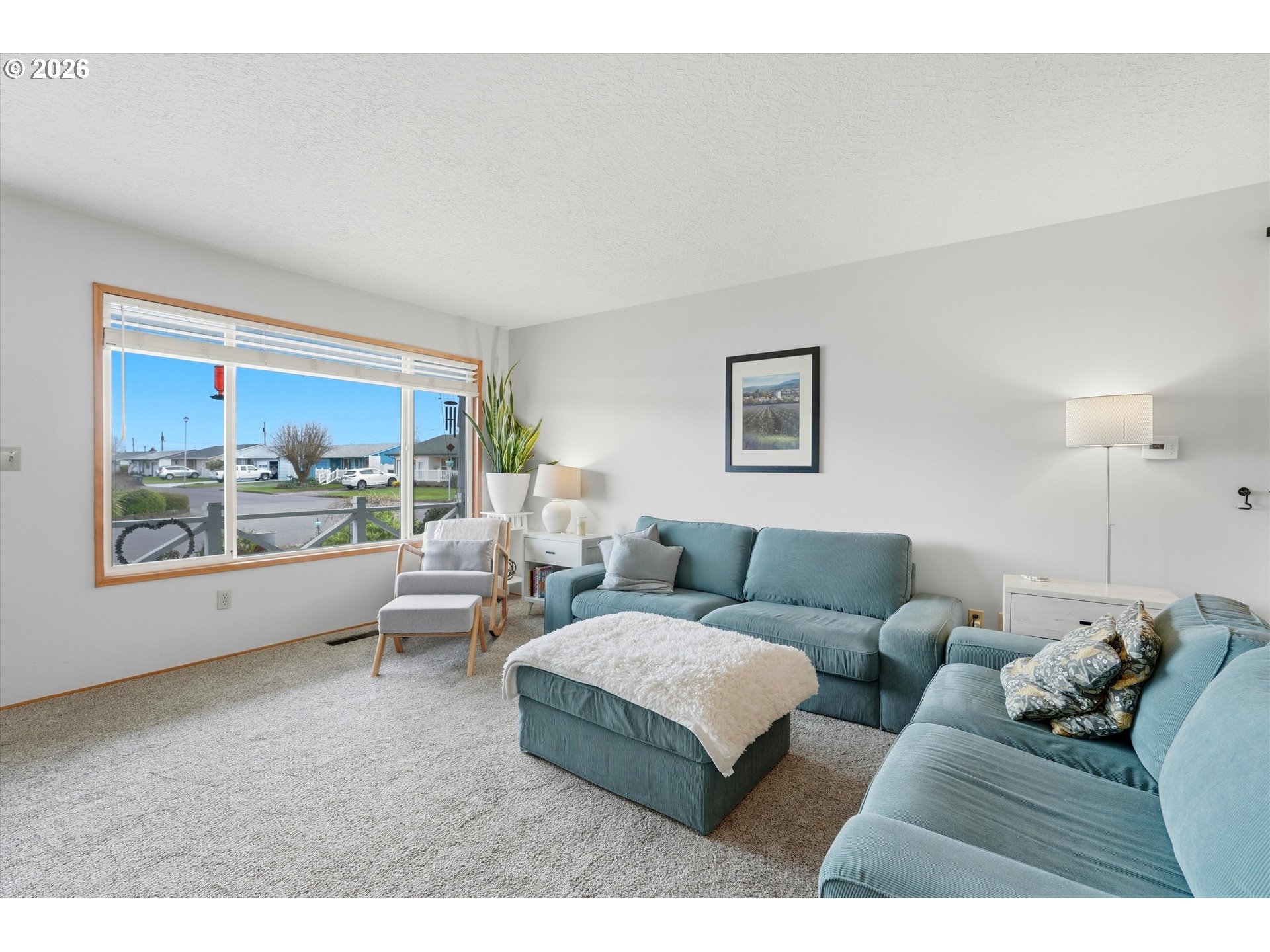 1841 Umpqua Road Woodburn, OR 97071 - Photo 9 of 41 a living room with furniture and a large window