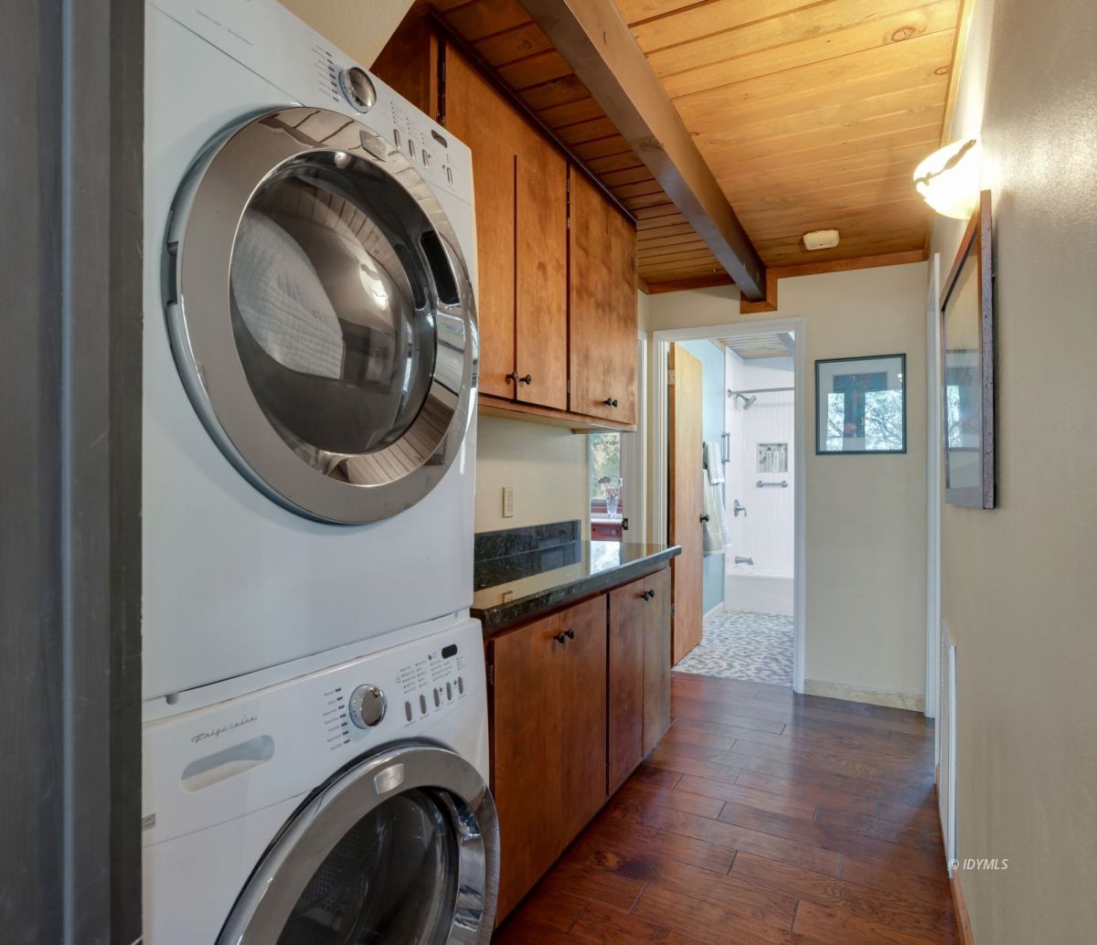 53460 West Ridge Road Idyllwild, CA 92549 - Photo 22 of 65 a view of a hallway with washer and dryer