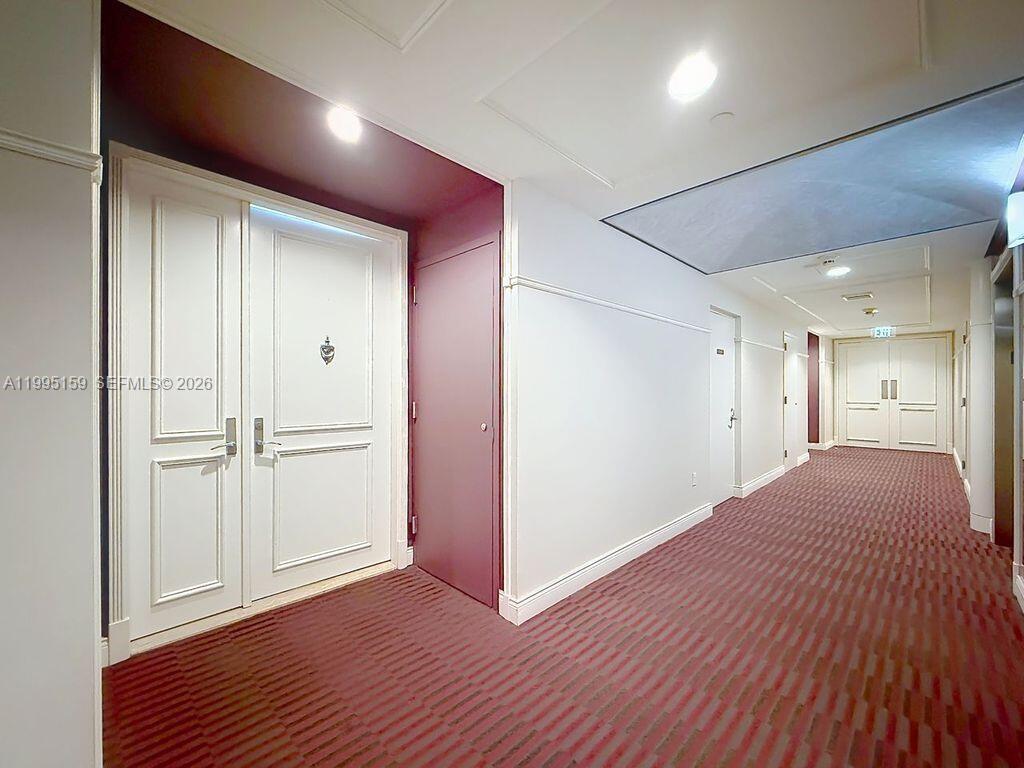 808 Brickell Key Drive, Unit 2002 Miami, FL 33131 - Photo 11 of 42 a view of a livingroom with wooden floor