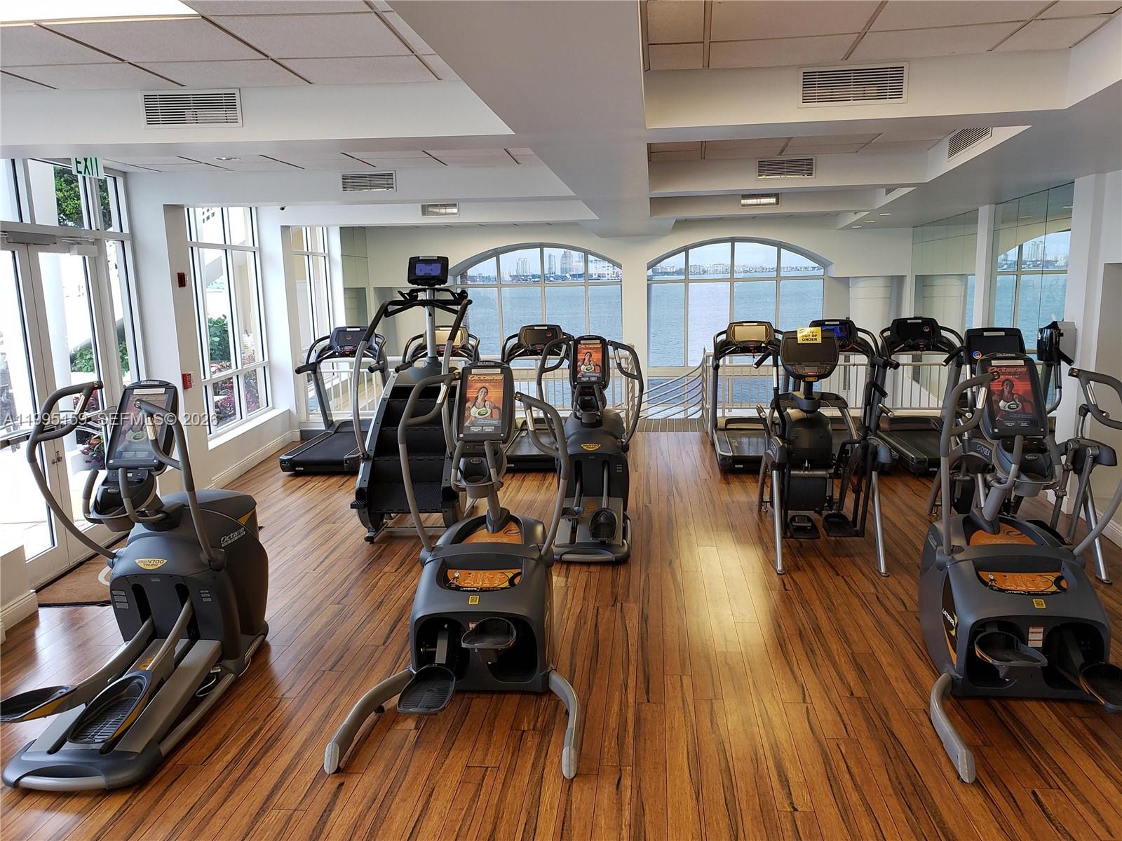 808 Brickell Key Drive, Unit 2002 Miami, FL 33131 - Photo 35 of 42 a view of a room with gym equipment