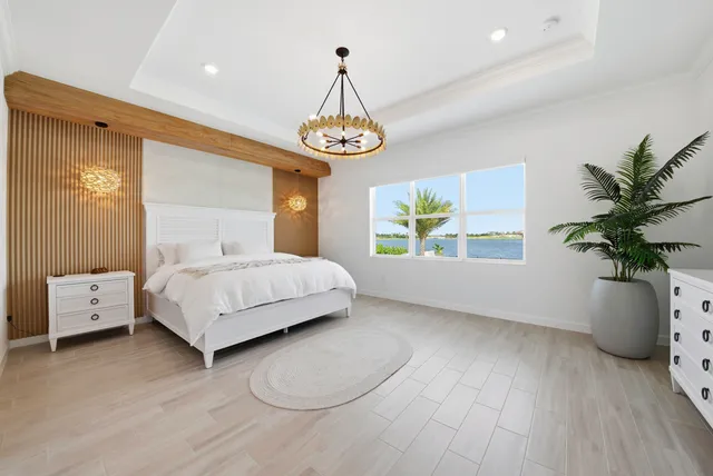 a view of a swimming pool with seating space