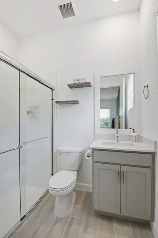 a living room with lots of furniture and a chandelier