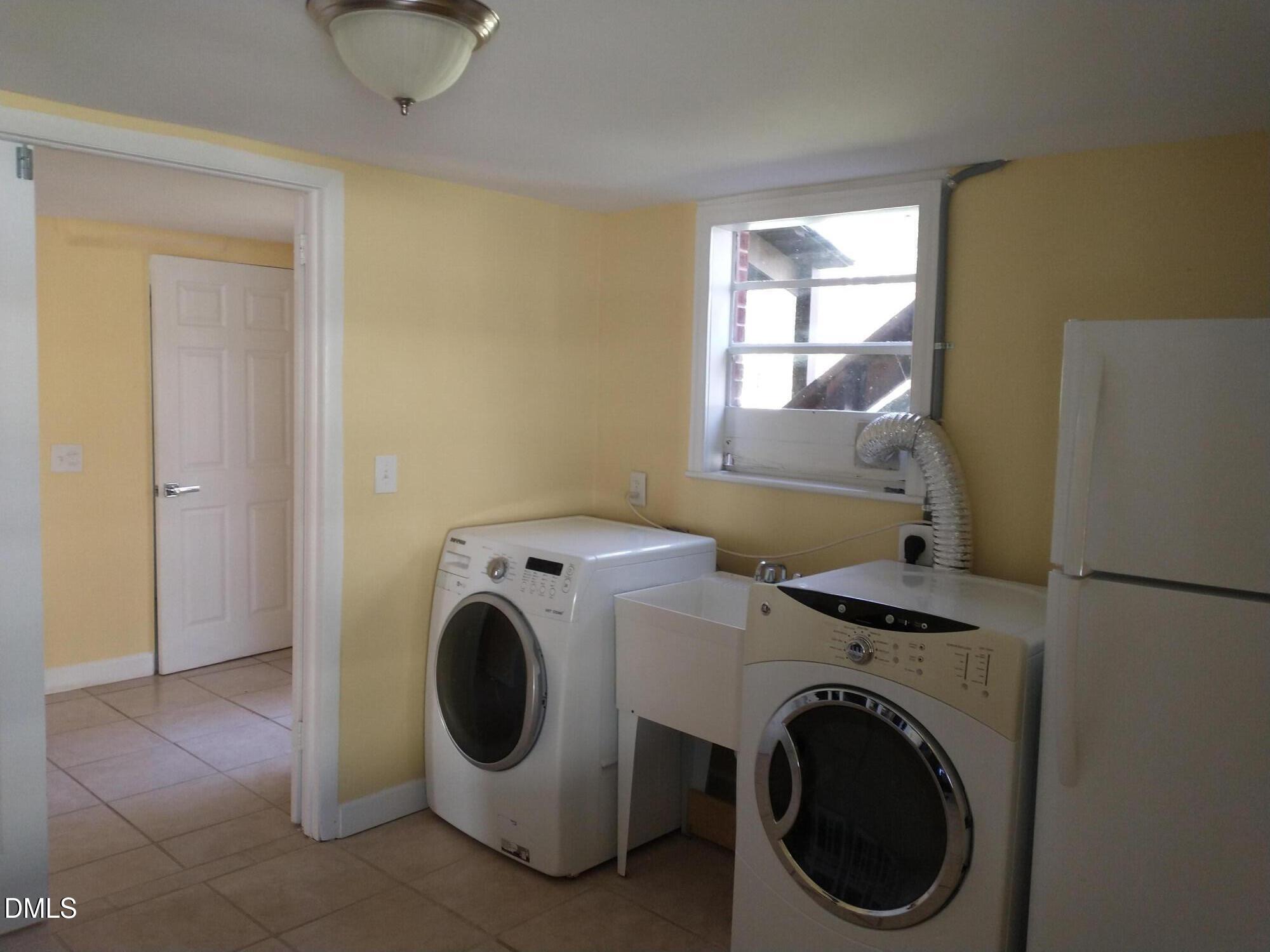 1302 Lorimer Road Raleigh, NC 27606 - Photo 20 of 23 a utility room with dryer and washer