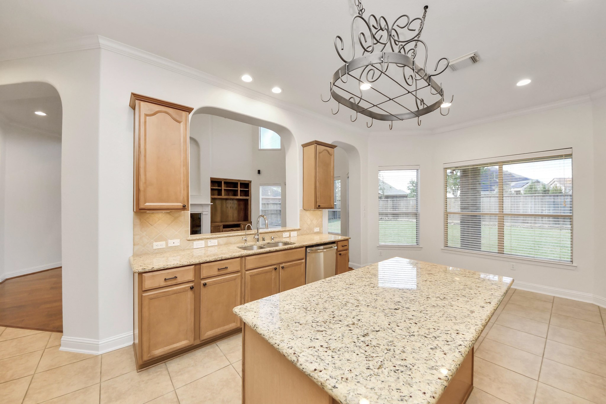 20519 Rosespring Lane Spring, TX 77379 - Photo 18 of 49 a large kitchen with kitchen island a large counter space appliances and cabinets