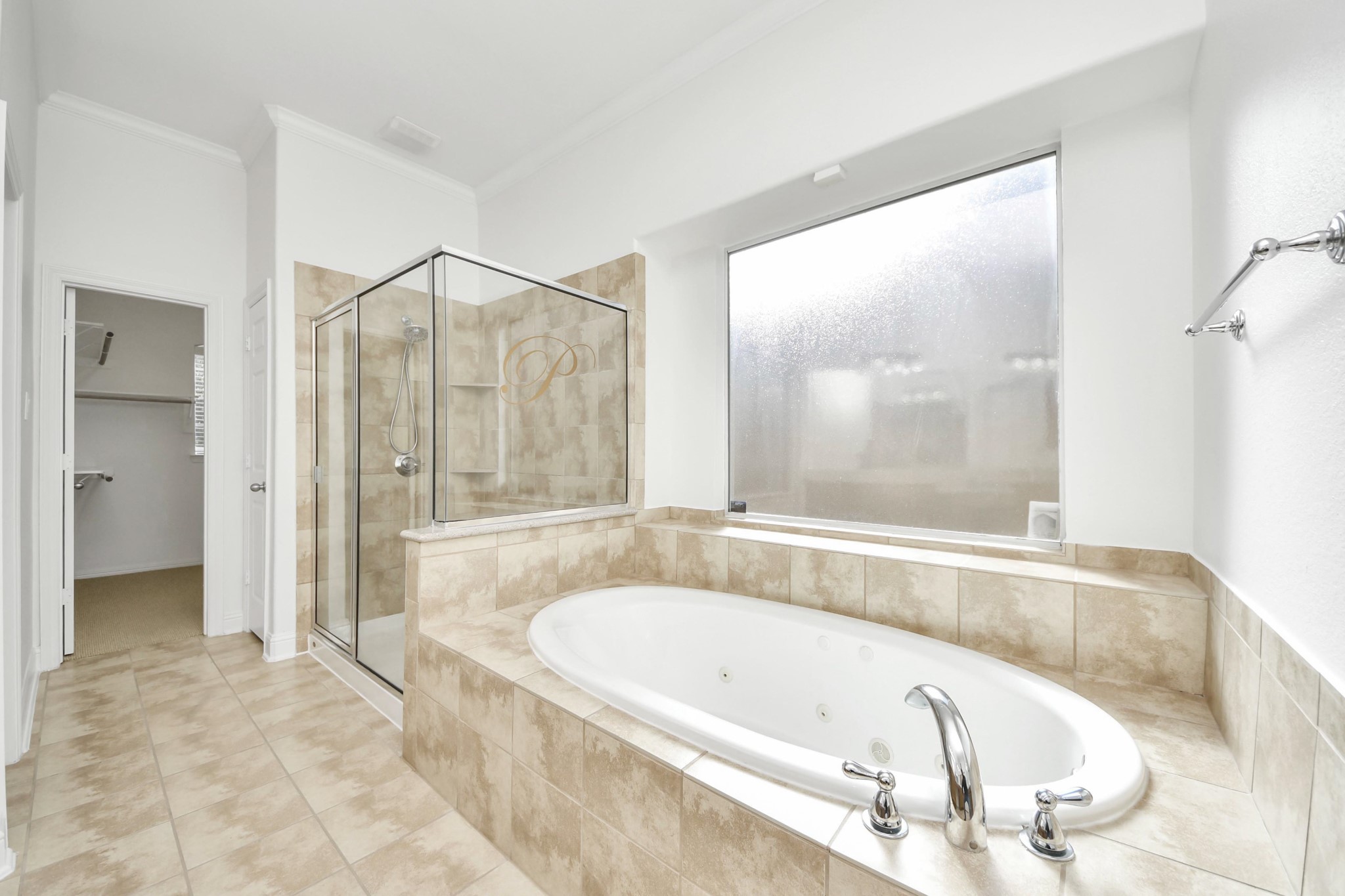 20519 Rosespring Lane Spring, TX 77379 - Photo 25 of 49 a bathroom with a bathtub and a shower