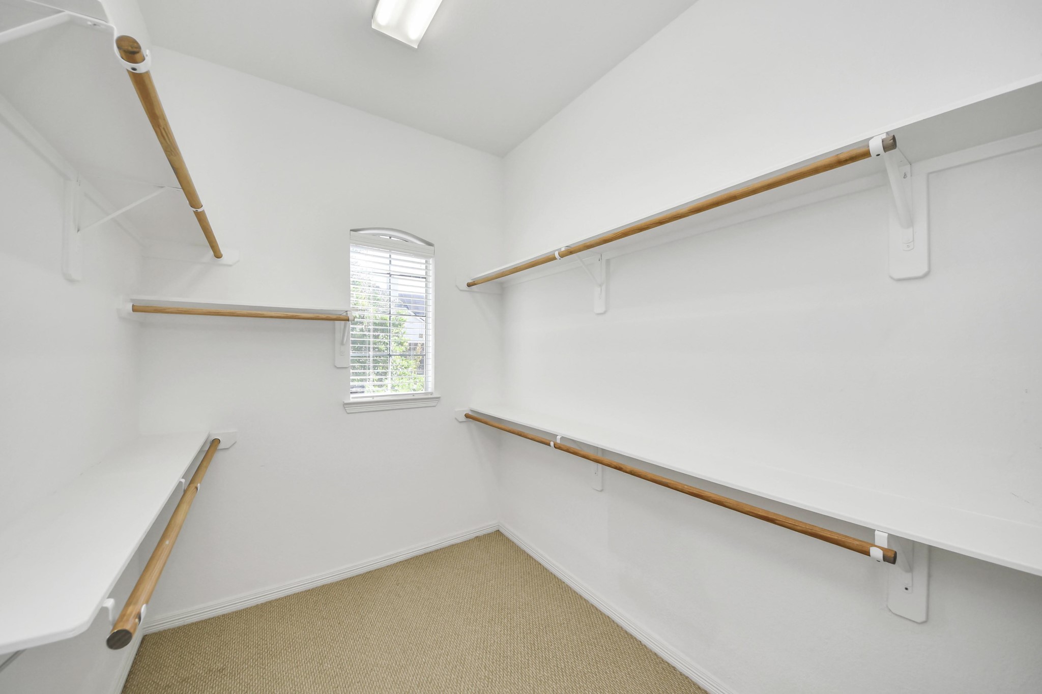 20519 Rosespring Lane Spring, TX 77379 - Photo 28 of 49 a view of a room with racks on the wall