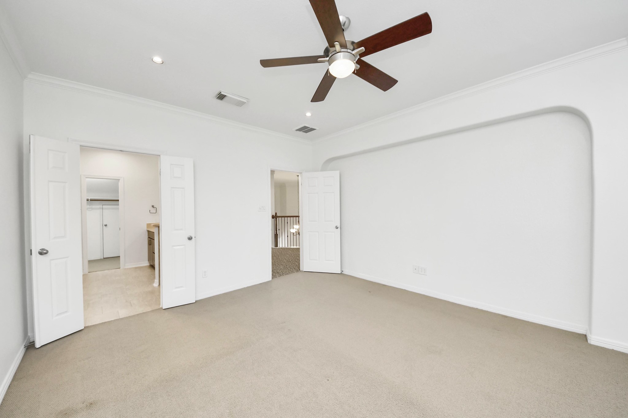 20519 Rosespring Lane Spring, TX 77379 - Photo 35 of 49 an empty room with a ceiling fan and carpet