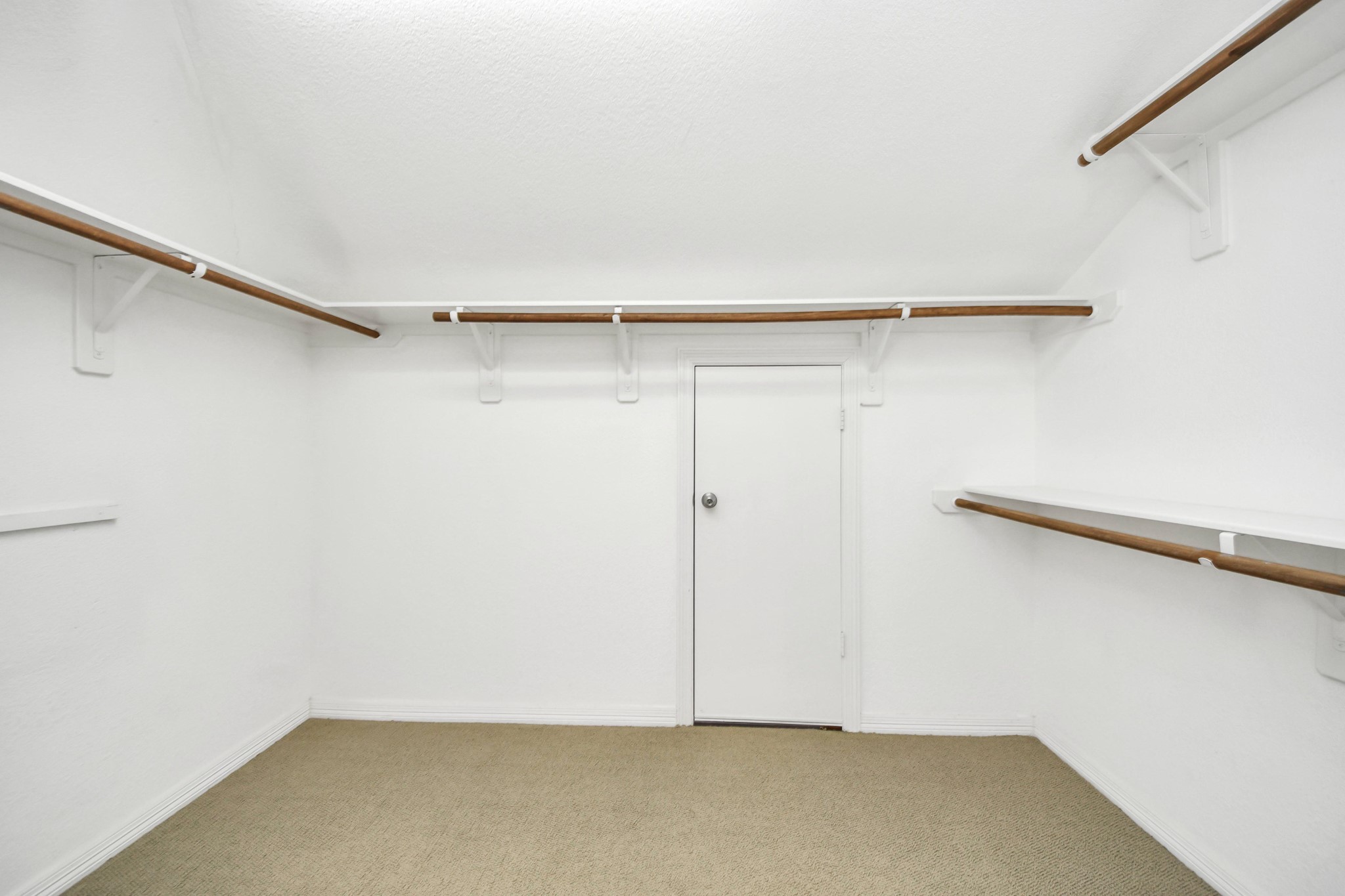 20519 Rosespring Lane Spring, TX 77379 - Photo 37 of 49 a view of small space with racks on the wall