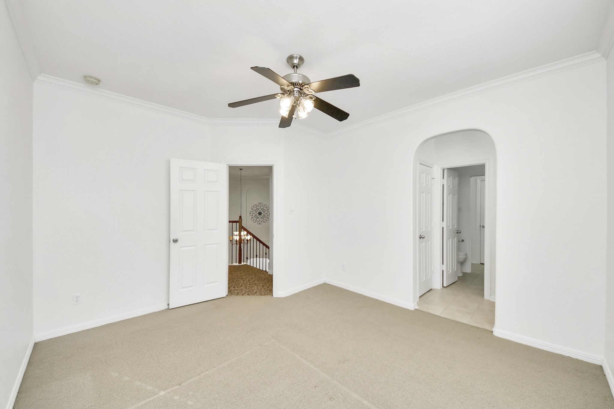 20519 Rosespring Lane Spring, TX 77379 - Photo 38 of 49 a view of a big room with closet and a chandelier fan