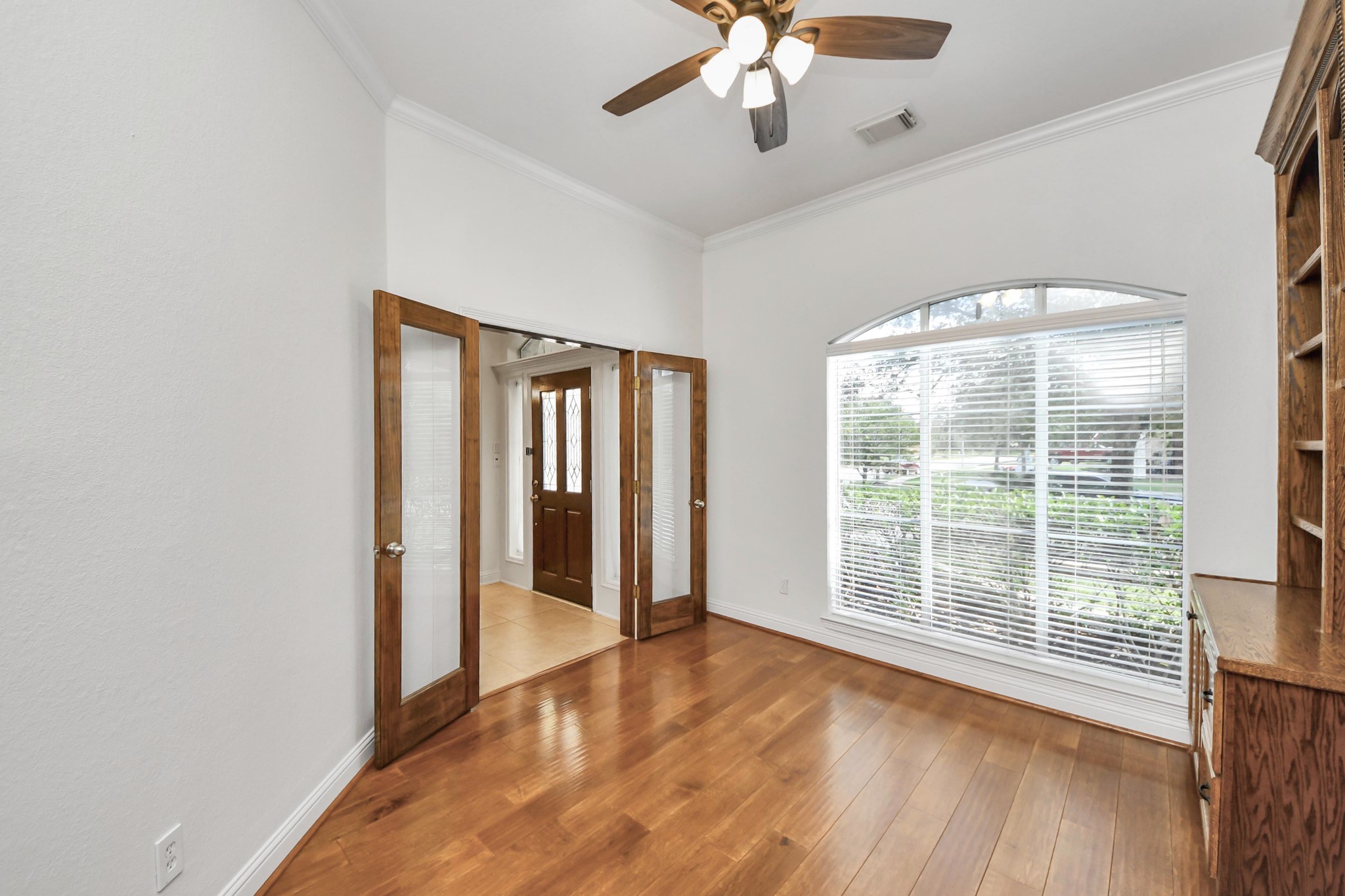 20519 Rosespring Lane Spring, TX 77379 - Photo 6 of 49 an empty room with wooden floor and windows