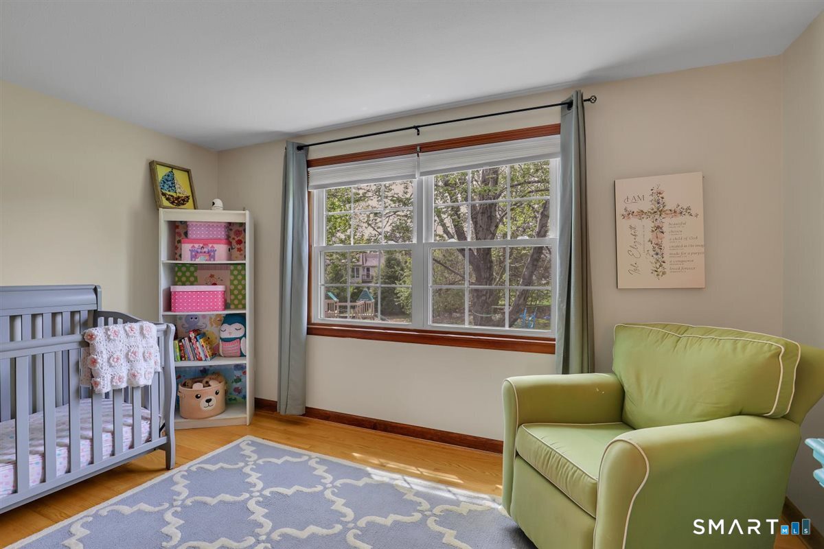 72 Old Post Road Wethersfield, CT 06109 - Photo 21 of 40 a living room with furniture and a window