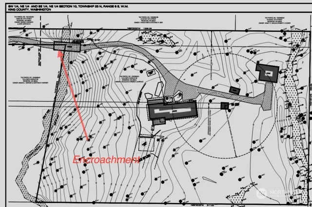 a white and white photo of a house