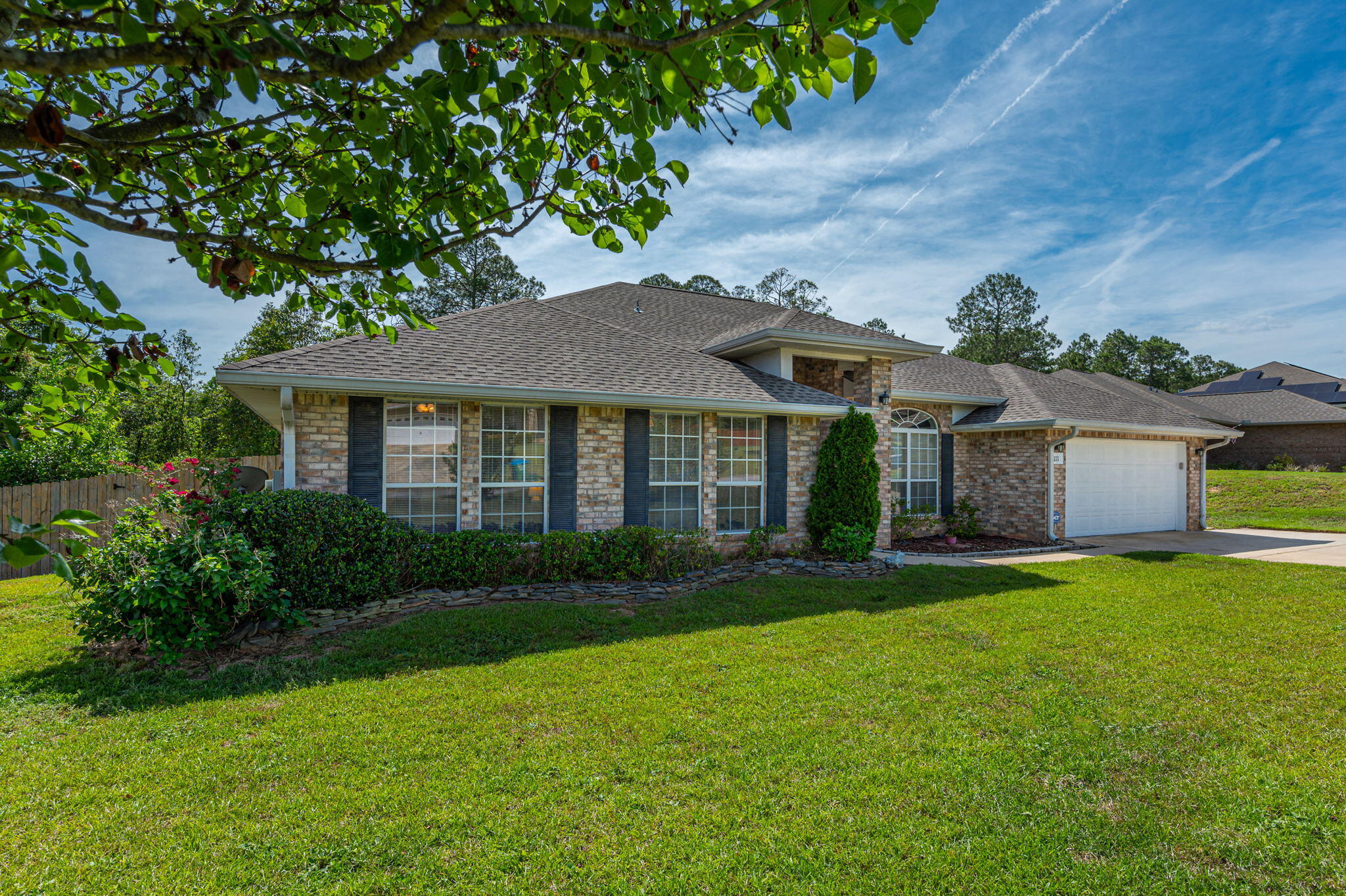 111 Strike Eagle Drive Crestview, FL 32536 - Photo 1 of 2 a front view of a house with garden