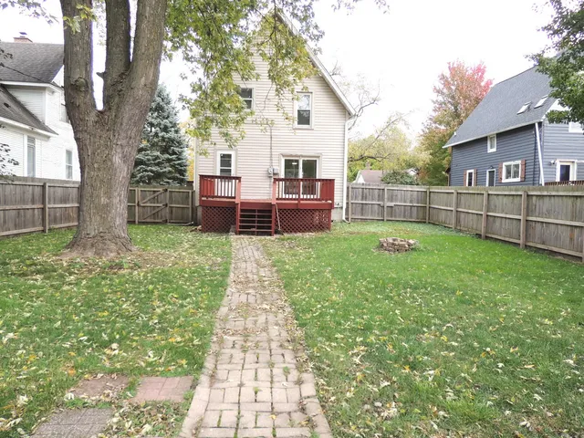 a backyard of a house with seating space
