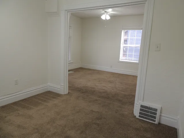 an empty room with windows