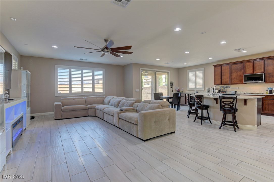 10042 Rams Leap Avenue Las Vegas, NV 89166 - Photo 4 of 26