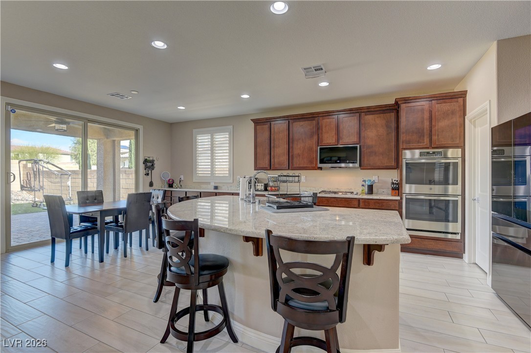 10042 Rams Leap Avenue Las Vegas, NV 89166 - Photo 8 of 26