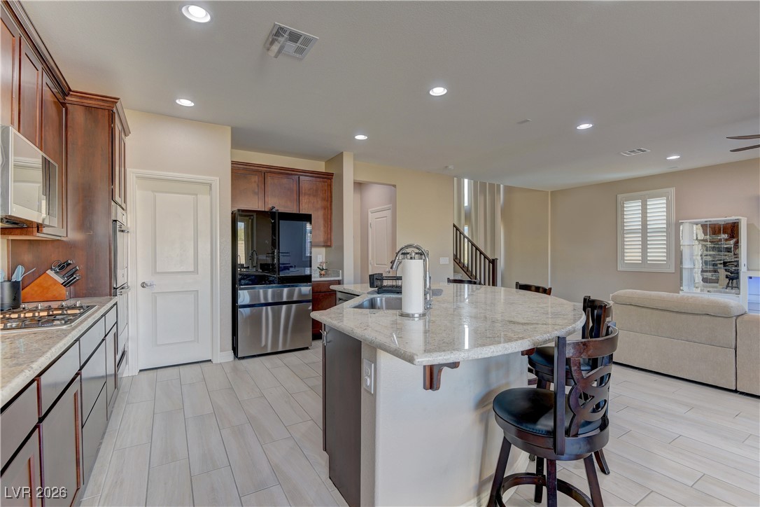 10042 Rams Leap Avenue Las Vegas, NV 89166 - Photo 9 of 26