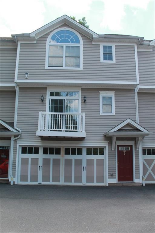 a front view of a house with a porch