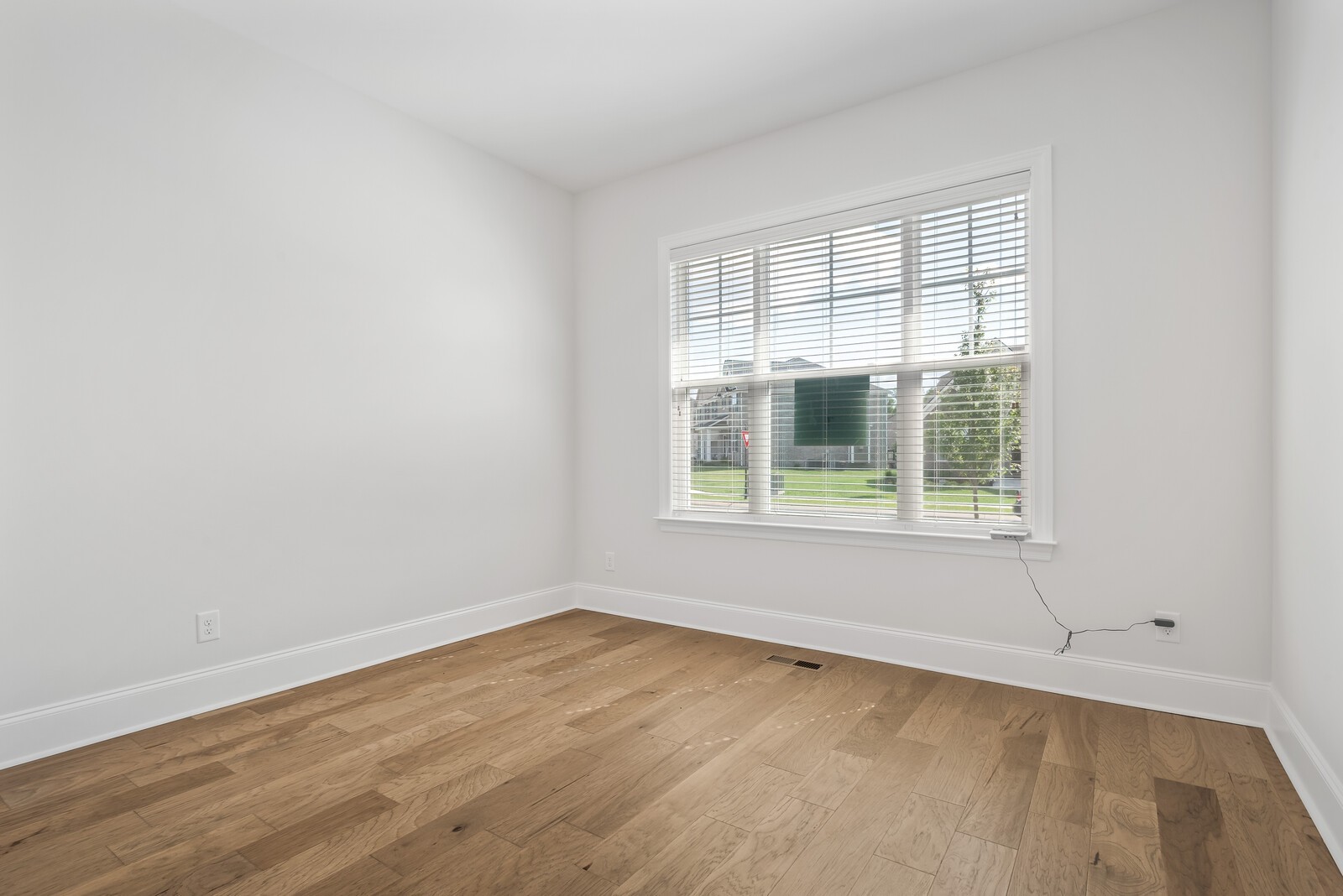 4195 Birmingham Road Lebanon, TN 37090 - Photo 11 of 53 an empty room with wooden floor and windows