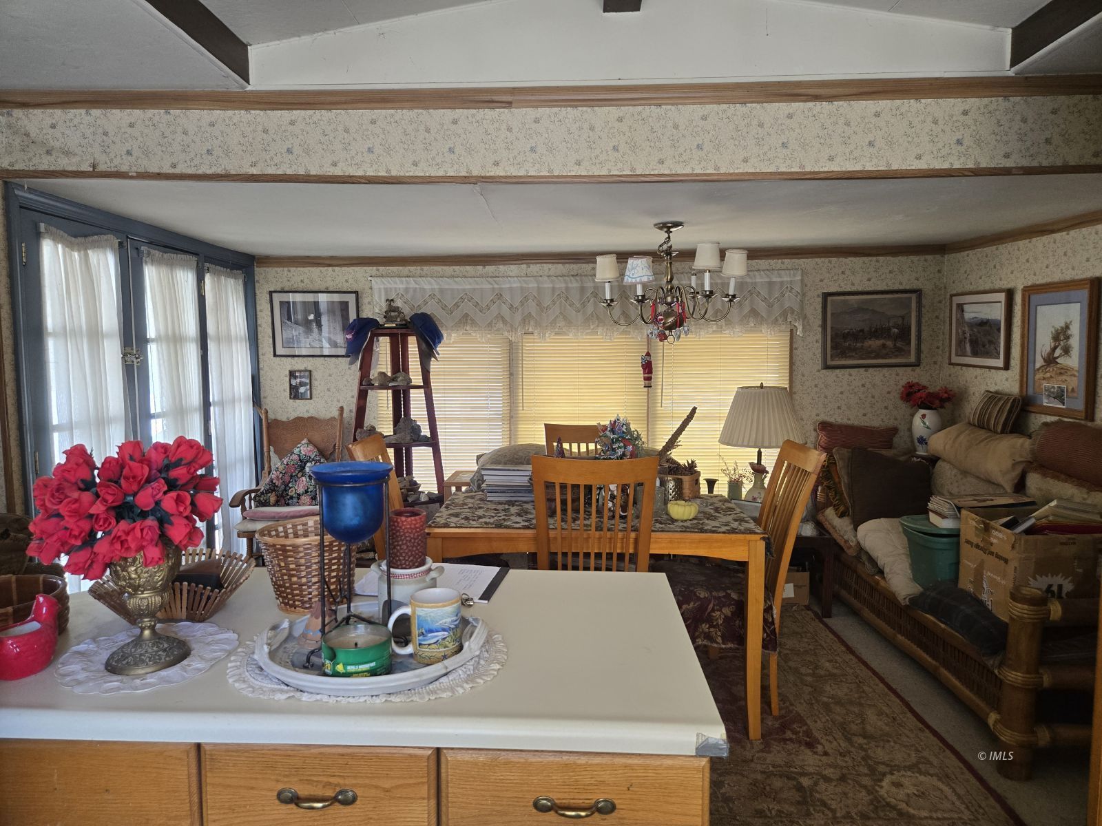 700 Glacier Lodge Road, Unit 12 Big Pine, CA 93513 - Photo 3 of 8 a view of living room with furniture and chandelier