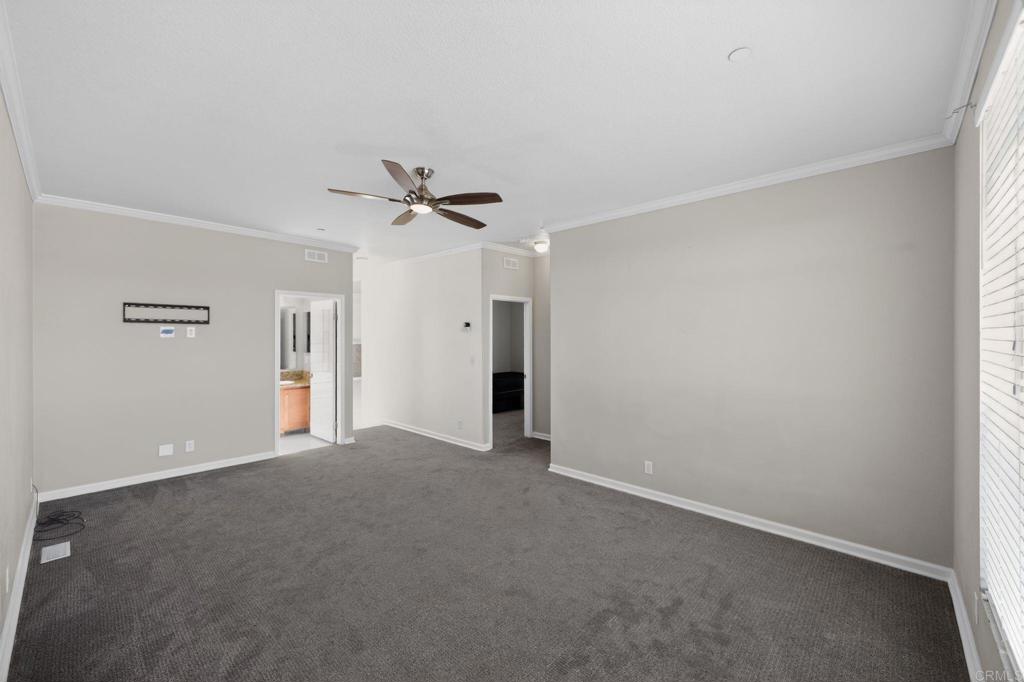 37455 Brandon Road Anza, CA 92539 - Photo 13 of 26 a view of a room with a ceiling fan and a window