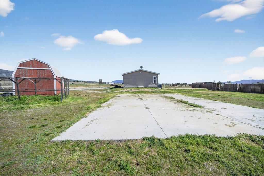 37455 Brandon Road Anza, CA 92539 - Photo 23 of 26 a view of a dry yard with a swimming pool
