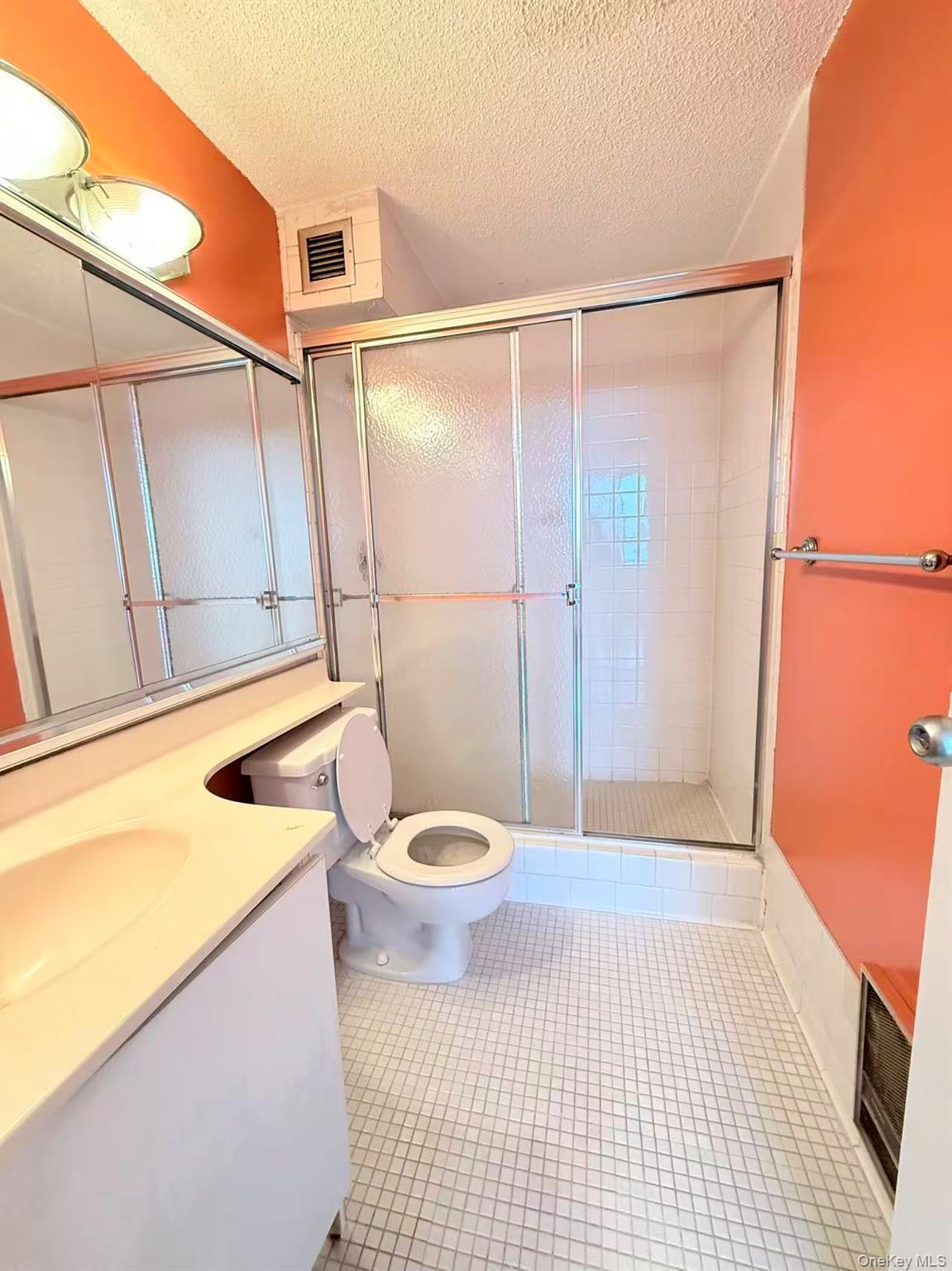 2 Bay Club Drive, Unit PHJ Queens, NY 11360 - Photo 13 of 17 a bathroom with a sink a toilet and shower