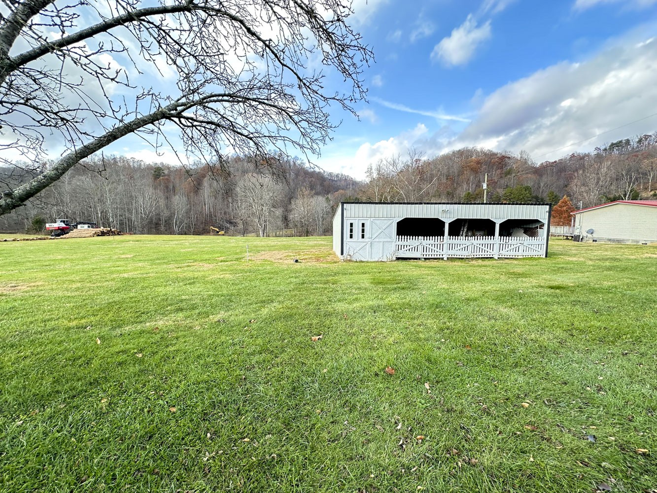 2641 Stanley Valley Road Surgoinsville, TN 37873 - Photo 24 of 26 a house view with a garden space