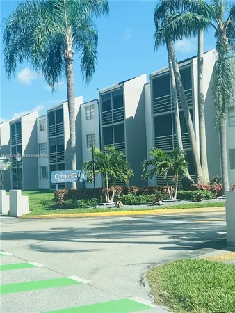 a view of a street with cars