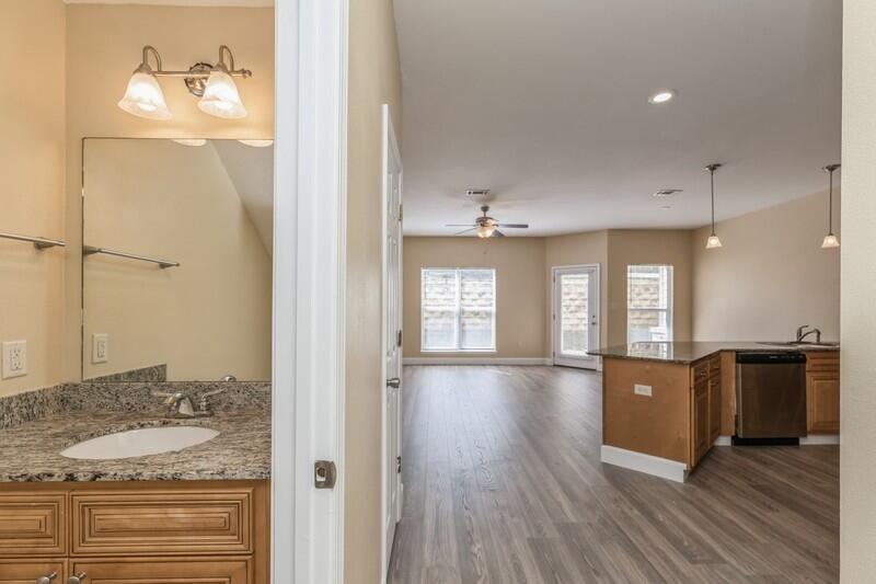 513 Arbor Lake Drive, Unit 513 Crestview, FL 32536 - Photo 17 of 37 a view of a kitchen cabinets and wooden floor