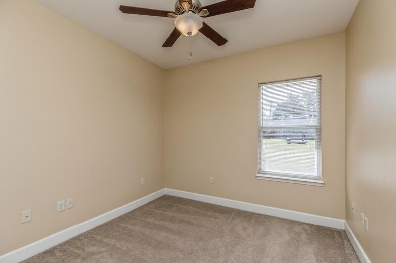 513 Arbor Lake Drive, Unit 513 Crestview, FL 32536 - Photo 31 of 37 an empty room with a window and a fan