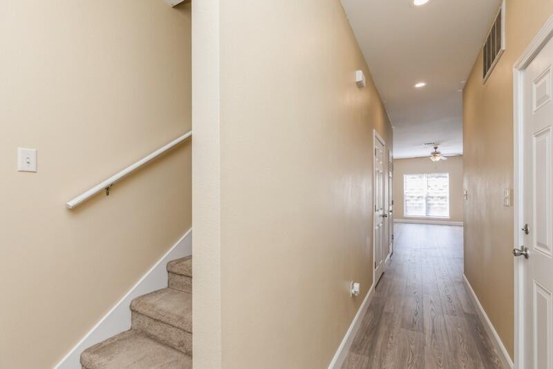 513 Arbor Lake Drive, Unit 513 Crestview, FL 32536 - Photo 5 of 37 a view of hallway with wooden floor